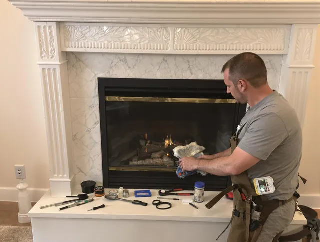 Lauderhill Chimney Sweep performing fireplace maintenance in Lauderhill, FL